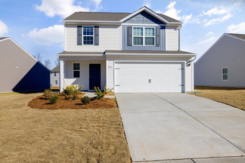 White and Blue House Under Blue Sky fix by Garage Door Repair Scotch Plains, NJ